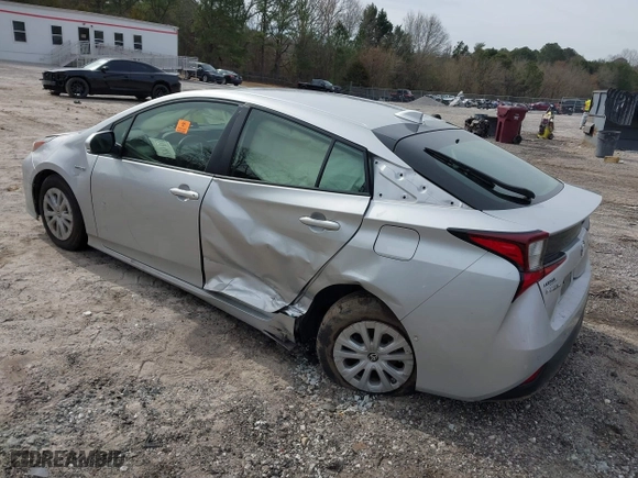 2021 Toyota Prius L Eco with VIN JTDKAMFU1M3152848, listed as a IAAI auction lot 41600212 with 140,114 mi miles. Bid and sale history available at carsss.com. Image 3.