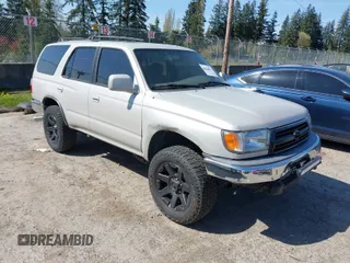 1999 Toyota 4Runner SR5 with VIN JT3GN86R0X0117581, listed as a IAAI auction lot 42045062 with 303,219 mi miles. Bid and sale history available at carsss.com. Image 1.
