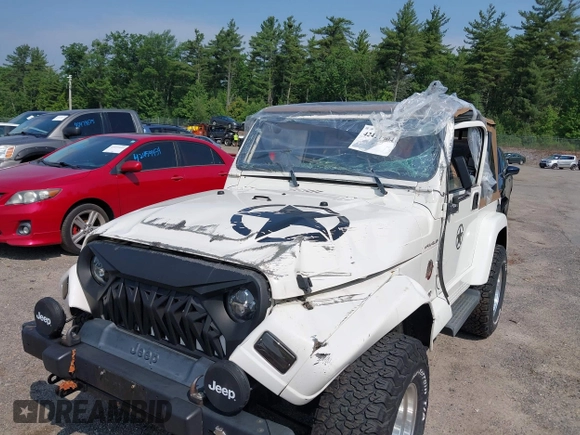 2002 Jeep Wrangler Sahara with VIN 1J4FA59S92P734763, listed as a IAAI auction lot 42411004 with 188,213 mi miles and . Bid and sale history available at DreamBid. Image 6.