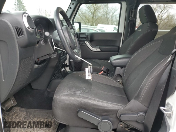 2016 Jeep Wrangler Sahara with VIN 1C4AJWBG5GL157885, listed as a Copart auction lot 51100655 with 73,090 mi miles and Salvage title. Bid and sale history available at DreamBid. Image 7.