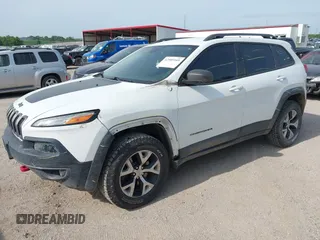 2015 Jeep Cherokee Trailhawk with VIN 1C4PJMBS6FW687718, listed as a IAAI auction lot 42505169 with 122,526 mi miles and . Bid and sale history available at DreamBid. Image 6.