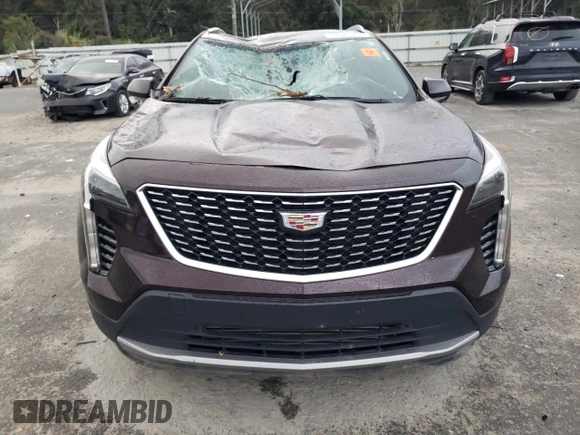 2020 Cadillac XT4 FWD Premium Luxury with VIN 1GYFZCR42LF149030, listed as a Copart auction lot 82671894 with 88,570 mi miles and Salvage title. Bid and sale history available at DreamBid. Image 5.