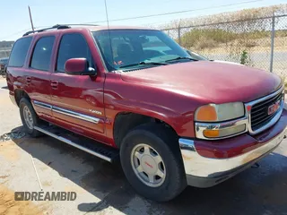 2004 GMC Yukon SLT with VIN 1GKEK13Z44R301456, listed as a IAAI auction lot 42056635 with 196,799 mi miles. Bid and sale history available at carsss.com. Image 1.