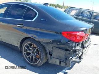 2018 BMW 5 Series 530e xDrive with VIN WBAJB1C58JB085443, listed as a IAAI auction lot 41856298 with 93,110 mi miles and . Bid and sale history available at DreamBid. Image 6.
