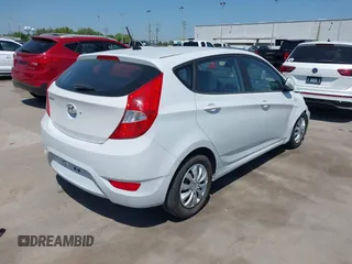 2017 Hyundai Accent SE with VIN KMHCT5AE0HU365659, listed as a IAAI auction lot 41989023 with 142,416 mi miles. Bid and sale history available at carsss.com. Image 4.