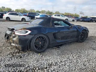 2014 Porsche Boxster z VIN WP0CA2A89ES121812, wystawiony jako Copart lot #73873054 z przebiegiem Nie podano mil oraz Szkoda całkowita • Salvage title. Historia ofert i sprzedaży dostępna na DreamBid. Obrazek 3.
