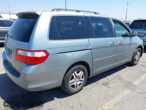 2007 Honda Odyssey EX-L with VIN 5FNRL38777B016421, listed as a IAAI auction lot 42139239 with 286,558 mi miles. Bid and sale history available at carsss.com. Image 4.