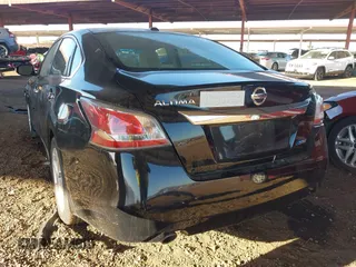 2014 Nissan Altima SL with VIN 1N4AL3AP7EC403087, listed as a IAAI auction lot 40977621 with 141,728 mi miles and . Bid and sale history available at DreamBid. Image 3.