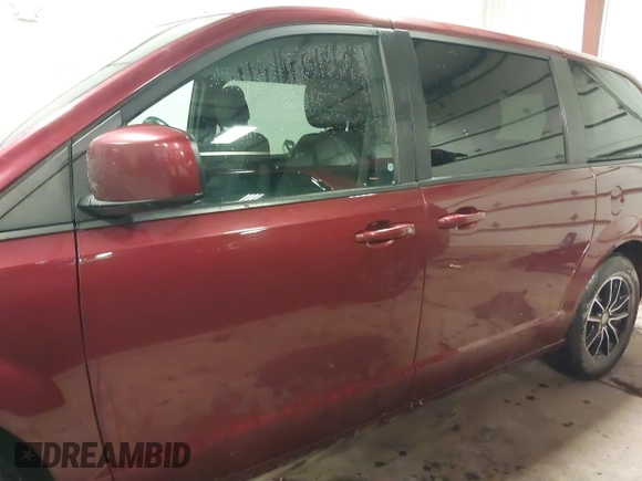 2018 Dodge Grand Caravan SE Plus with VIN 2C4RDGBG0JR200575, listed as a IAAI auction lot 41596033 with 137,523 mi miles and . Bid and sale history available at DreamBid. Image 15.