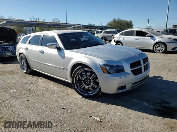 2006 Dodge Magnum R/T z VIN 2D8GV57286H122762, wystawiony jako Copart lot #83399984 z przebiegiem 200 443 mil mil oraz Szkody całkowita. Historia ofert i sprzedaży dostępna na DreamBid. Obrazek 11.