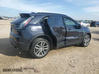 2023 Cadillac XT4 FWD Sport with VIN 1GYFZER42PF102436, listed as a Copart auction lot 84529474 with 33,679 mi miles and Salvage Title. Bid and sale history available at carsss.com. Image 3.