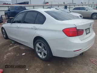 2012 BMW 3 Series 328i z VIN WBA3A5C50CF344263, wystawiony jako IAAI lot #41619368 z przebiegiem 124 635 mil mil oraz . Historia ofert i sprzedaży dostępna na DreamBid. Obrazek 3.