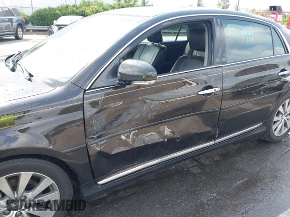 2012 Toyota Avalon with VIN 4T1BK3DB8CU458894, listed as a IAAI auction lot 42414799 with 163,212 mi miles and . Bid and sale history available at DreamBid. Image 6.