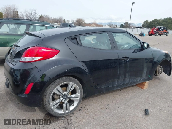 2013 Hyundai Veloster w/Black Int with VIN KMHTC6AD8DU155575, listed as a IAAI auction lot 41722849 with 100,204 mi miles and . Bid and sale history available at DreamBid. Image 4.