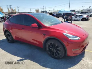 2021 Tesla Model Y Long Range with VIN 5YJYGDEE0MF217761, listed as a Copart auction lot 56525075 with 72,751 mi miles and Salvage Title. Bid and sale history available at DreamBid. Image 4.