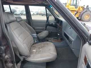 1991 Jeep Cherokee with VIN 1J4FJ88S0ML527479, listed as a IAAI auction lot 42189457 with 321,419 mi miles and . Bid and sale history available at DreamBid. Image 5.