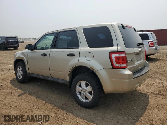 2011 Ford Escape XLS with VIN 1FMCU0C75BKC58172, listed as a Copart auction lot 60492825 with 114,518 mi miles and Salvage title. Bid and sale history available at DreamBid. Image 2.