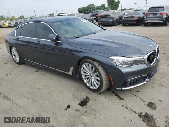 2016 BMW 7 Series 740i with VIN WBA7E2C51GG546677, listed as a Copart auction lot 63455445 with 106,553 mi miles and Salvage title. Bid and sale history available at DreamBid. Image 4.