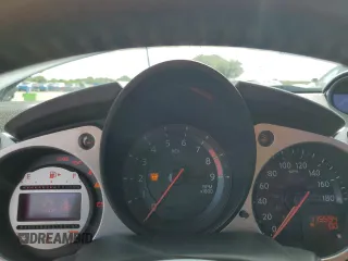 2010 Nissan 370Z Touring with VIN JN1AZ4EH2AM506507, listed as a Copart auction lot 70469504 with 115,594 mi miles and Salvage Title. Bid and sale history available at carsss.com. Image 9.