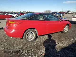 2001 Saturn SC with VIN 1G8ZY12751Z284992, listed as a Copart auction lot 87116694 with 134,690 mi miles and Clean Title. Bid and sale history available at carsss.com. Image 3.