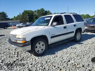 2000 Chevrolet Tahoe LS with VIN 1GNEK13T2YJ203352, listed as a Copart auction lot 58077765 with 314,293 mi miles and Salvage title. Bid and sale history available at DreamBid. Image 1.