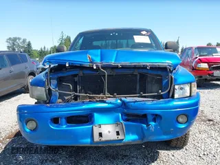 2001 Dodge 1500 z VIN 3B7HF13Z31M533735, wystawiony jako IAAI lot #42417352 z przebiegiem 184 487 mil mil oraz . Historia ofert i sprzedaży dostępna na DreamBid. Obrazek 13.