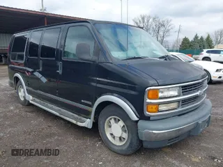 1999 Chevrolet Chevy Van z VIN 1GBFG15M0X1048842, wystawiony jako IAAI lot #41978139 z przebiegiem 188 274 mil mil oraz . Historia ofert i sprzedaży dostępna na DreamBid. Obrazek 1.