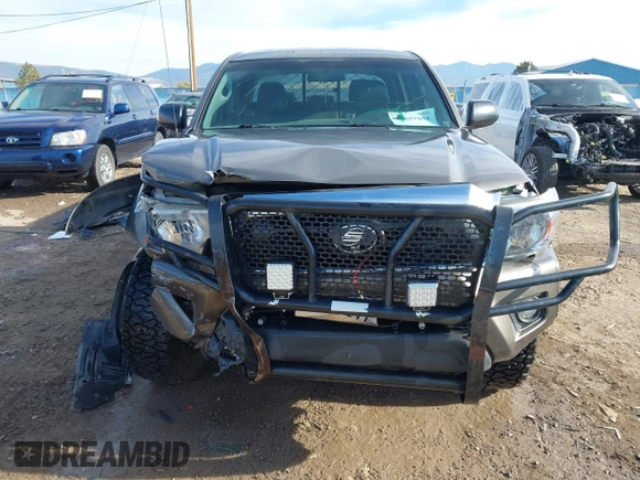 2014 Toyota Tacoma with VIN 3TMLU4EN3EM143882, listed as a IAAI auction lot 40657975 with 125,008 mi miles. Bid and sale history available at carsss.com. Image 12.