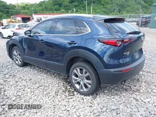 2021 Mazda CX-30 Premium z VIN 3MVDMBDL7MM236474, wystawiony jako IAAI lot #42284515 z przebiegiem 58 565 mil mil oraz . Historia ofert i sprzedaży dostępna na DreamBid. Obrazek 3.