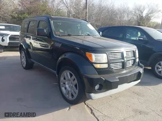 2011 Dodge Nitro Heat with VIN 1D4PT4GK3BW602009, listed as a IAAI auction lot 41766143 with 107,823 mi miles. Bid and sale history available at carsss.com. Image 1.