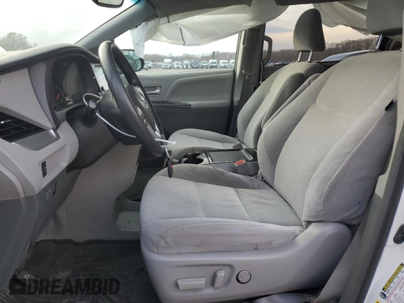 2017 Toyota Sienna LE with VIN 5TDJZ3DCXHS180970, listed as a Copart auction lot 88876535 with 180,318 mi miles and Salvage Title. Bid and sale history available at carsss.com. Image 7.