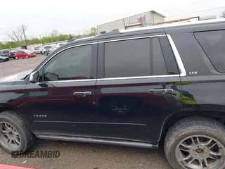 2016 Chevrolet Tahoe LTZ with VIN 1GNSKCKC7GR171904, listed as a IAAI auction lot 41967060 with 223,334 mi miles and . Bid and sale history available at DreamBid. Image 15.