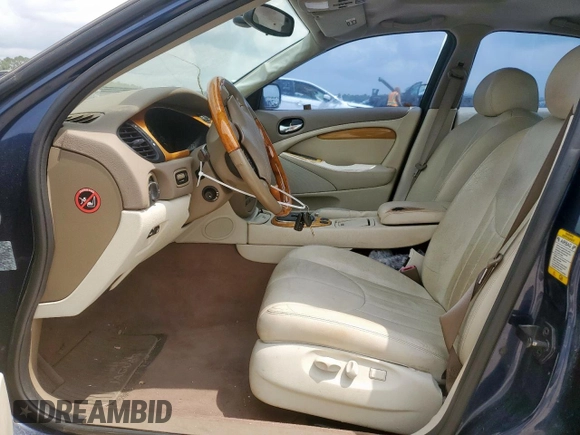 2000 Jaguar S-Type V6 z VIN SAJDA01C1YFL61738, wystawiony jako Copart lot #60363845 z przebiegiem 114 996 mil mil oraz Czysty tytuł • Clean title. Historia ofert i sprzedaży dostępna na DreamBid. Obrazek 7.