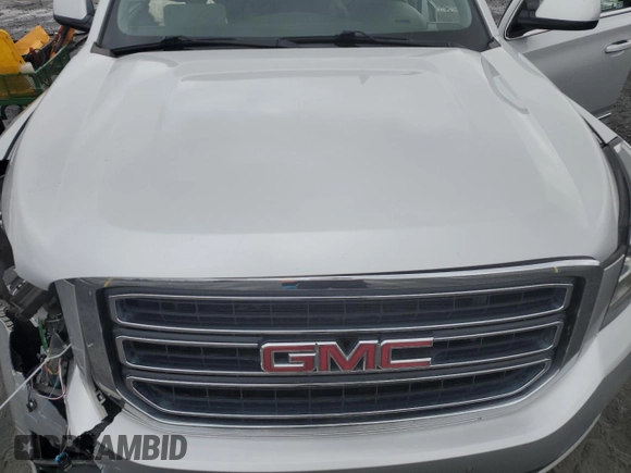 2015 GMC Yukon XL SLT with VIN 1GKS2HKC8FR616031, listed as a Copart auction lot 48740785 with 128,467 mi miles and Salvage Title. Bid and sale history available at carsss.com. Image 14.