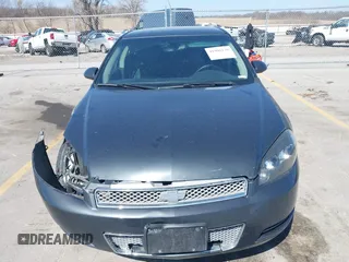 2013 Chevrolet Impala LT with VIN 2G1WB5E31D1163179, listed as a IAAI auction lot 41908130 with 190,801 mi miles and . Bid and sale history available at DreamBid. Image 12.