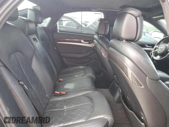 2015 Audi S8 z VIN WAUK2AFD1FN005378, wystawiony jako Copart lot #53048314 z przebiegiem 131 468 mil mil oraz . Historia ofert i sprzedaży dostępna na DreamBid. Obrazek 11.