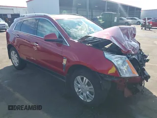 2012 Cadillac SRX Luxury Collection z VIN 3GYFNAE38CS527327, wystawiony jako IAAI lot #41516387 z przebiegiem 133 951 mil mil oraz . Historia ofert i sprzedaży dostępna na DreamBid. Obrazek 1.