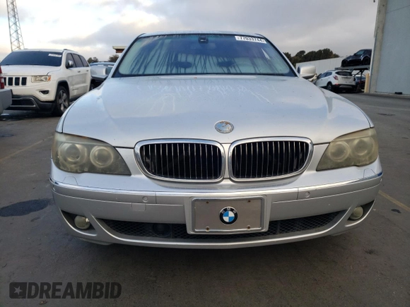2006 BMW 7 Series 750i with VIN WBAHL83586DT05258, listed as a Copart auction lot 77033744 with 129,376 mi miles and Salvage Title. Bid and sale history available at DreamBid. Image 5.