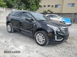 2019 Cadillac XT5 FWD with VIN 1GYKNARS4KZ113480, listed as a Copart auction lot 50328075 with 73,064 mi miles and Non Repairable. Bid and sale history available at carsss.com. Image 4.
