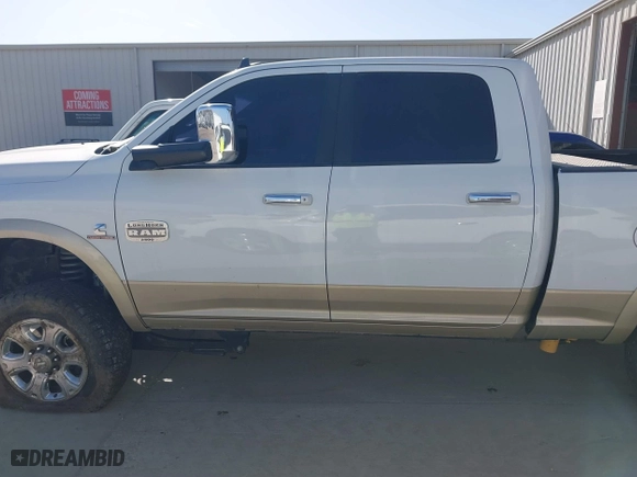 2014 Ram 2500 Longhorn with VIN 3C6UR5GLXEG244401, listed as a IAAI auction lot 41779709 with 180,760 mi miles. Bid and sale history available at carsss.com. Image 14.