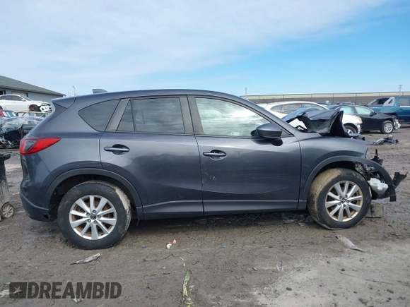 2014 Mazda CX-5 Touring with VIN JM3KE4CY6E0387767, listed as a IAAI auction lot 41698128 with 1 mi miles. Bid and sale history available at carsss.com. Image 14.