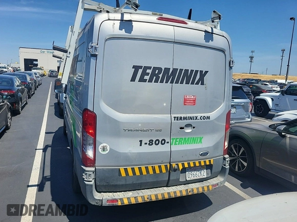 2017 Ford Transit Cargo with VIN 1FTYE1CM0HKB43622, listed as a IAAI auction lot 42670548 with 202,530 mi miles and . Bid and sale history available at DreamBid. Image 14.