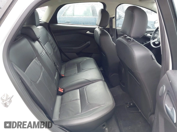 2015 Ford Focus Titanium z VIN 1FADP3N28FL262273, wystawiony jako IAAI lot #42552995 z przebiegiem 60 504 mil mil oraz . Historia ofert i sprzedaży dostępna na DreamBid. Obrazek 8.