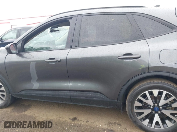 2020 Ford Escape SE Sport Hybrid with VIN 1FMCU0BZ0LUC52871, listed as a IAAI auction lot 42225741 with Not provided miles and . Bid and sale history available at DreamBid. Image 13.