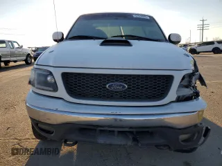 2000 Ford F-150 XL with VIN 1FTRX18L3YKA09007, listed as a Copart auction lot 42828005 with 218,563 mi miles and Salvage Title. Bid and sale history available at carsss.com. Image 5.