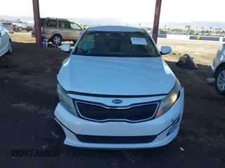2014 Kia Optima EX z VIN 5XXGN4A74EG294124, wystawiony jako IAAI lot #41413272 z przebiegiem 154 058 mil mil oraz . Historia ofert i sprzedaży dostępna na DreamBid. Obrazek 12.