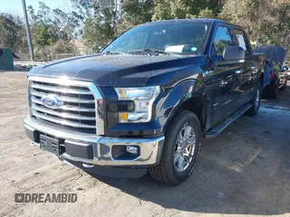 2015 Ford F-150 XLT with VIN 1FTEW1EG6FKF22211, listed as a IAAI auction lot 41753438 with 130,019 mi miles. Bid and sale history available at carsss.com. Image 2.