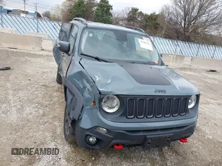 2015 Jeep Renegade Trailhawk z VIN ZACCJBCT4FPB79254, wystawiony jako IAAI lot #41965451 z przebiegiem 87 398 mil mil oraz . Historia ofert i sprzedaży dostępna na DreamBid. Obrazek 12.