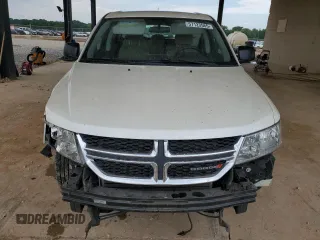 2013 Dodge Journey American Value with VIN 3C4PDCAB5DT656997, listed as a Copart auction lot 57123565 with 201,799 mi miles and Salvage title. Bid and sale history available at DreamBid. Image 5.