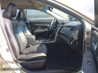 2015 Toyota Camry Hybrid LE with VIN 4T1BD1FK1FU174975, listed as a IAAI auction lot 42085034 with 54,728 mi miles. Bid and sale history available at carsss.com. Image 5.